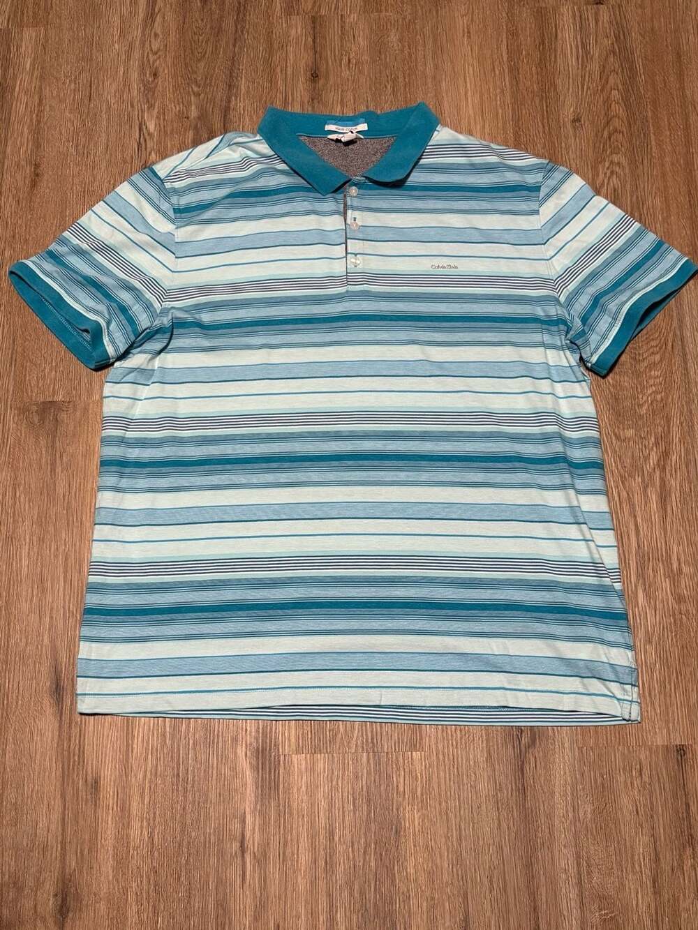 Calvin Klein polo shirt XL (Chest size 46 in)Fits like a Large